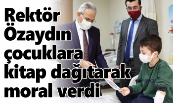 Rektör Özaydın çocuklara kitap dağıtarak moral verdi