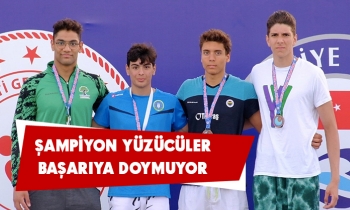 ŞAMPİYON YÜZÜCÜLER BAŞARIYA DOYMUYOR